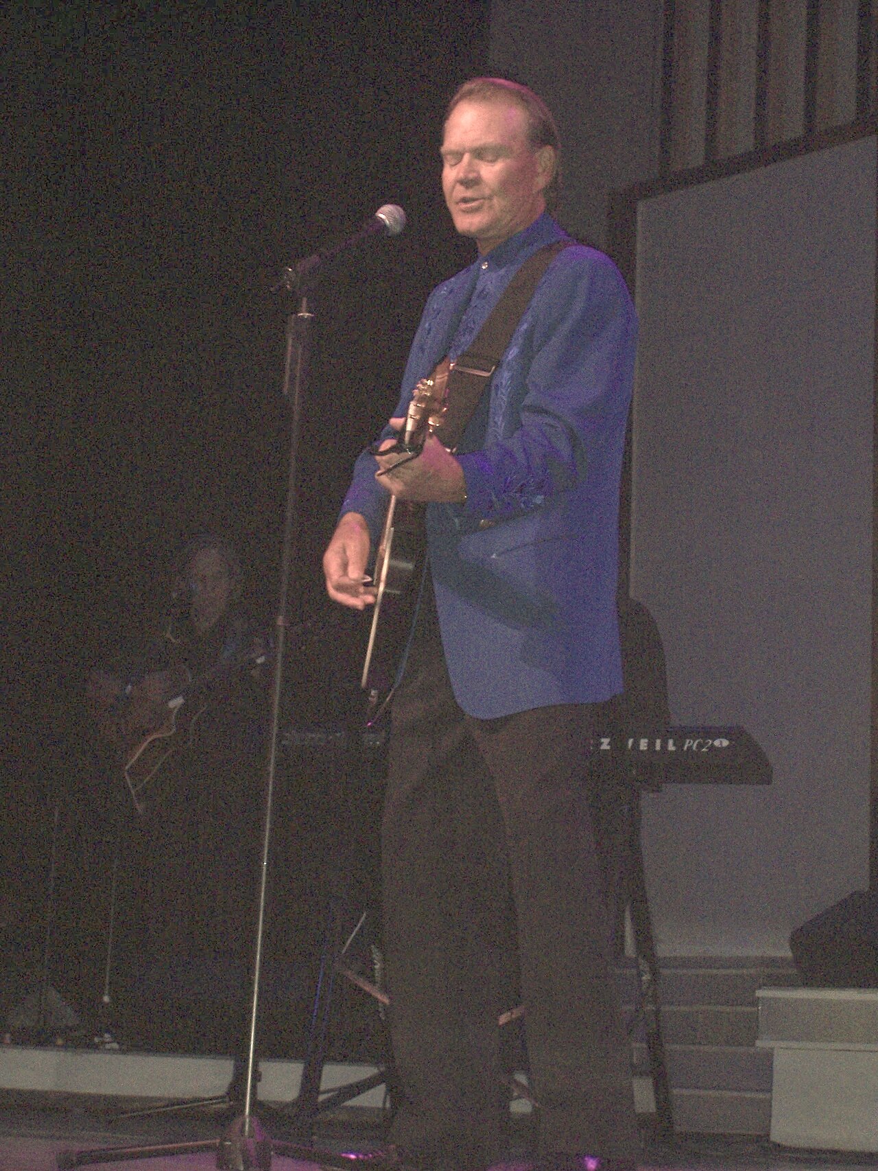 Glen Campbell performing on stage in Branson, Missouri, 2006
